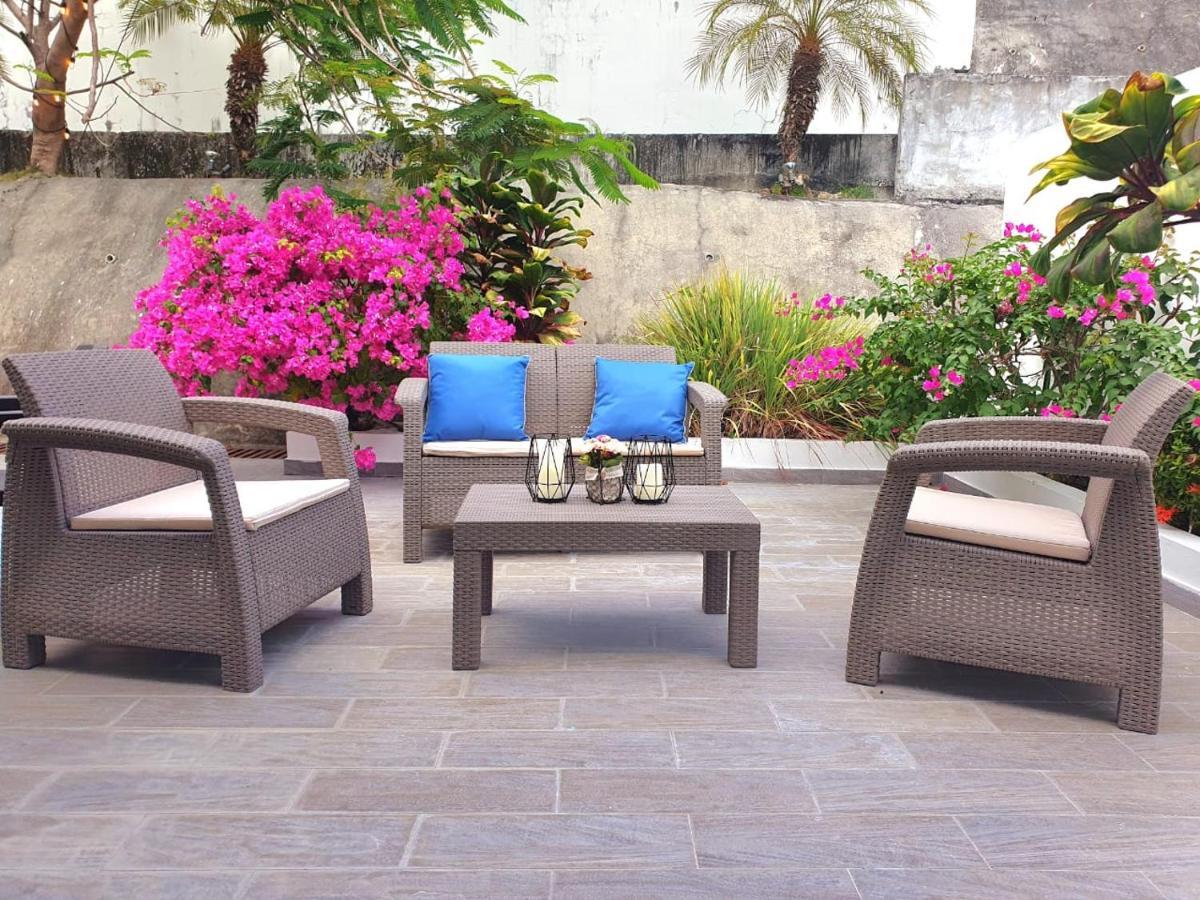 With Cozy Terrace